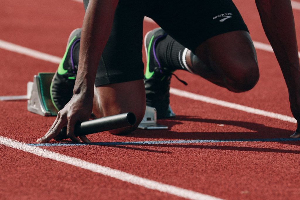 Athletes competing on a running track
